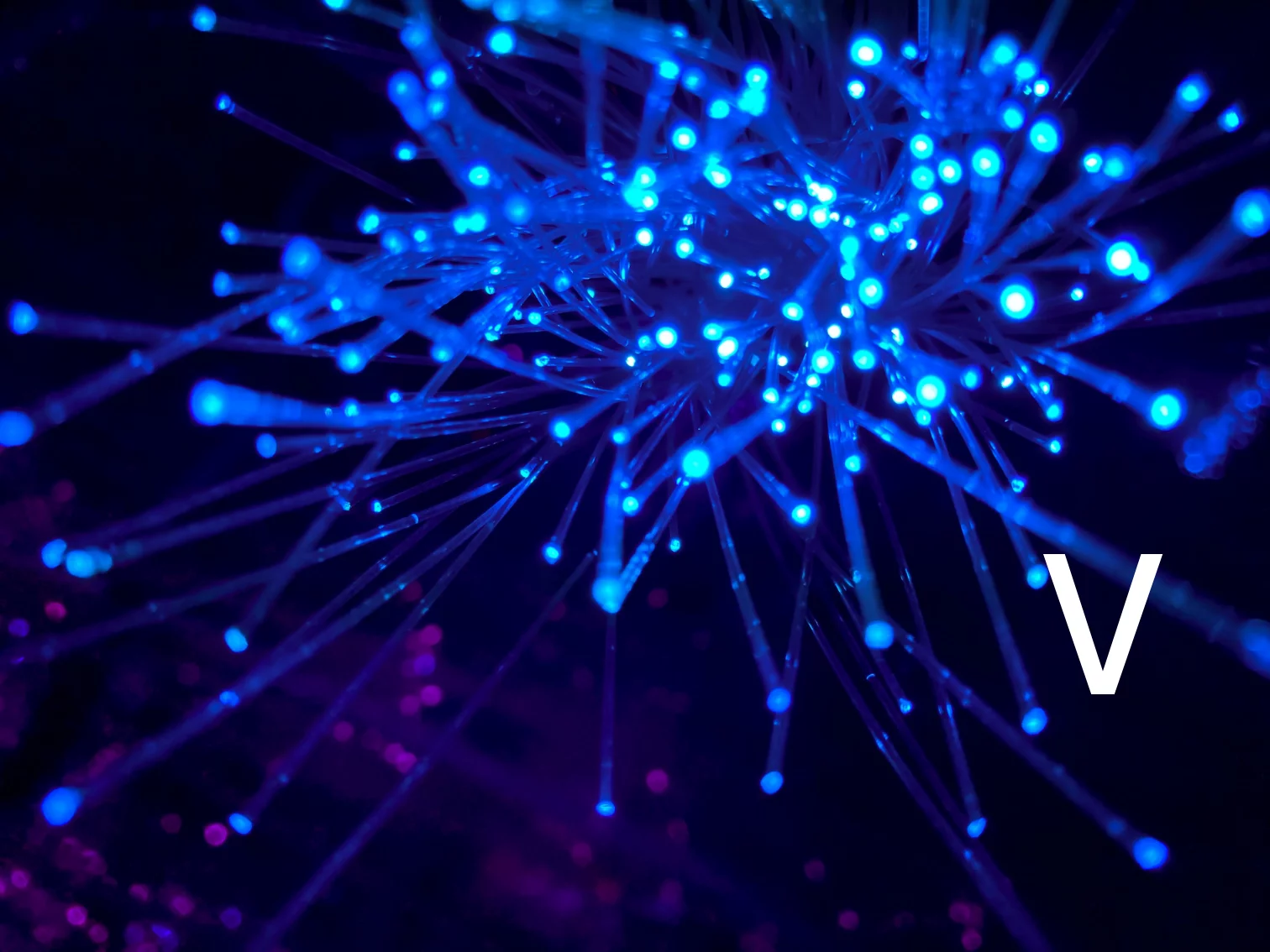 Original photo by JJ Ying on Unsplash. A nice image with blue and purple lights.