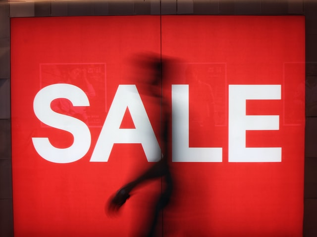 A picture of a big "SALE" sign, photo by Justin Lim on Unsplash.