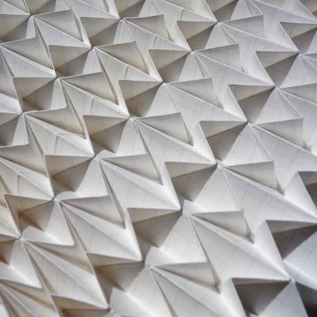 A picture of some paper sheets folded in a nice pattern
