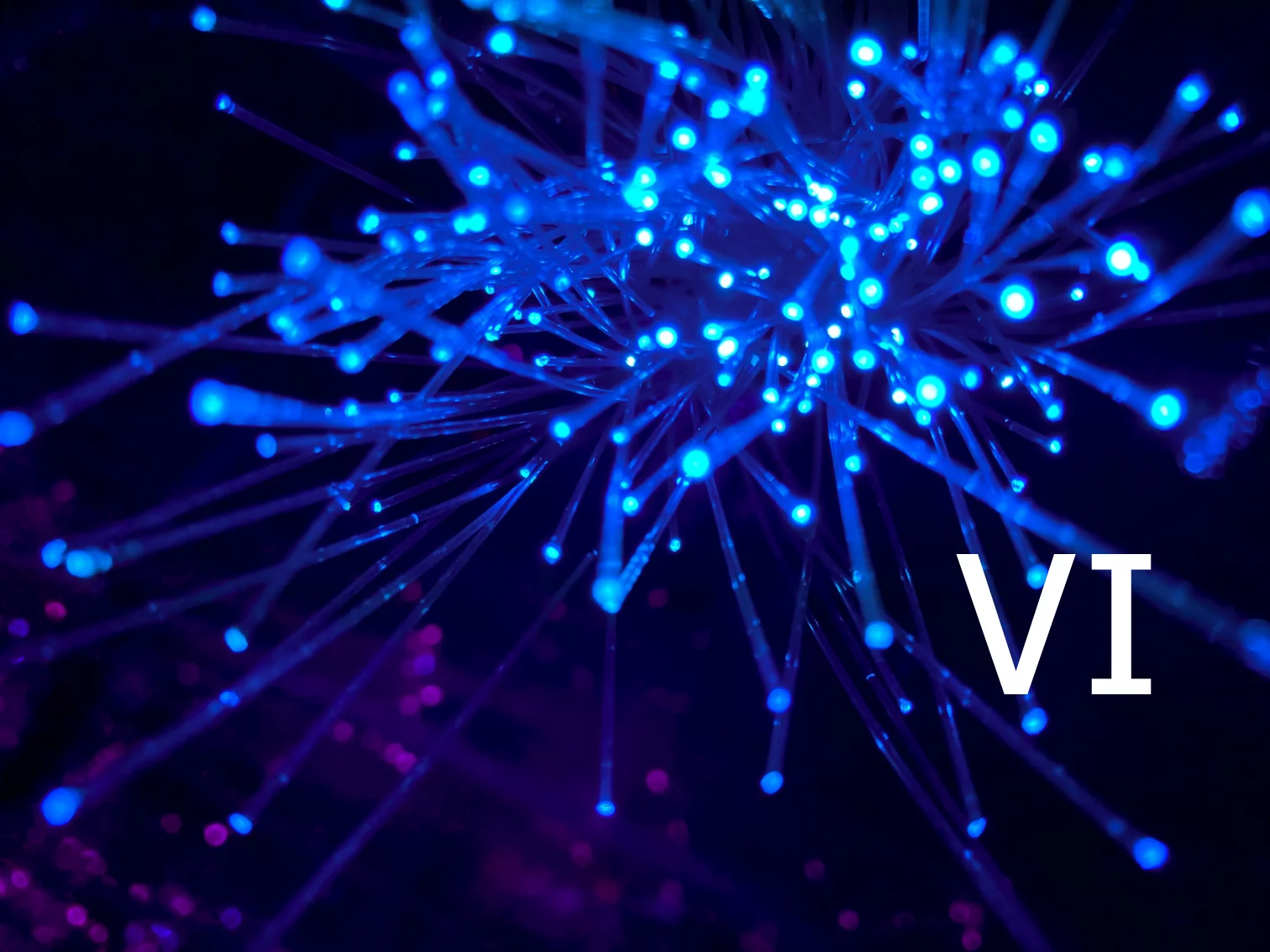 Original photo by JJ Ying on Unsplash. A nice image with blue and purple lights.