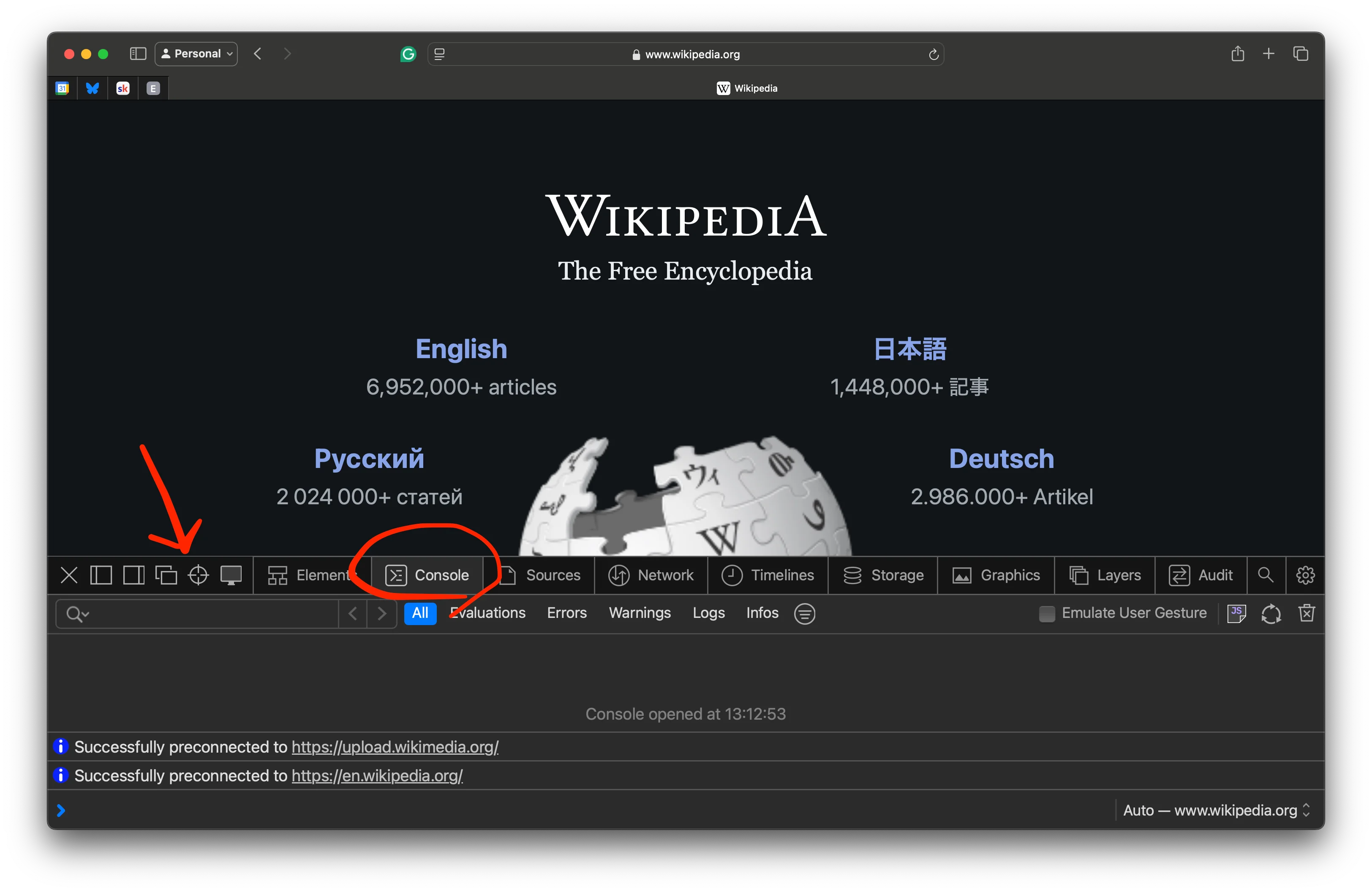 A console opened at the bottom of the Wikipedia page, showing a large number of different tabs. The leftmost says 'elements' and the second to the left says 'console' and is selected, showing a mostly empty pane with a code prompt at the bottom.