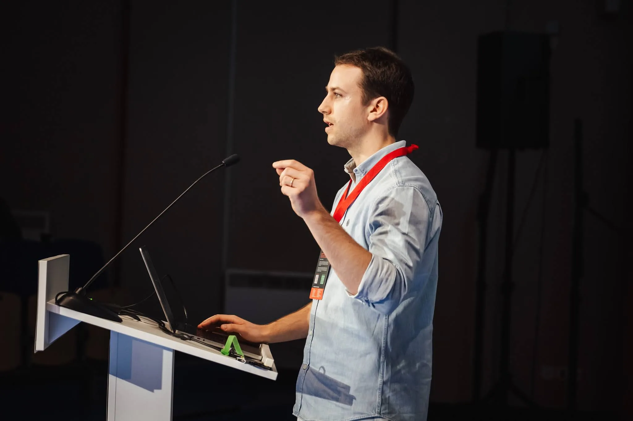 Rodrigo making the audience go “What the Python?” Side shot of Rodrigo giving a lightning talk.